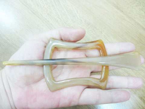 Light shade buffalo horn hair barrette